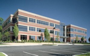 Modern office building with glass windows.