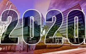 2020 text overlaid on cityscape background.